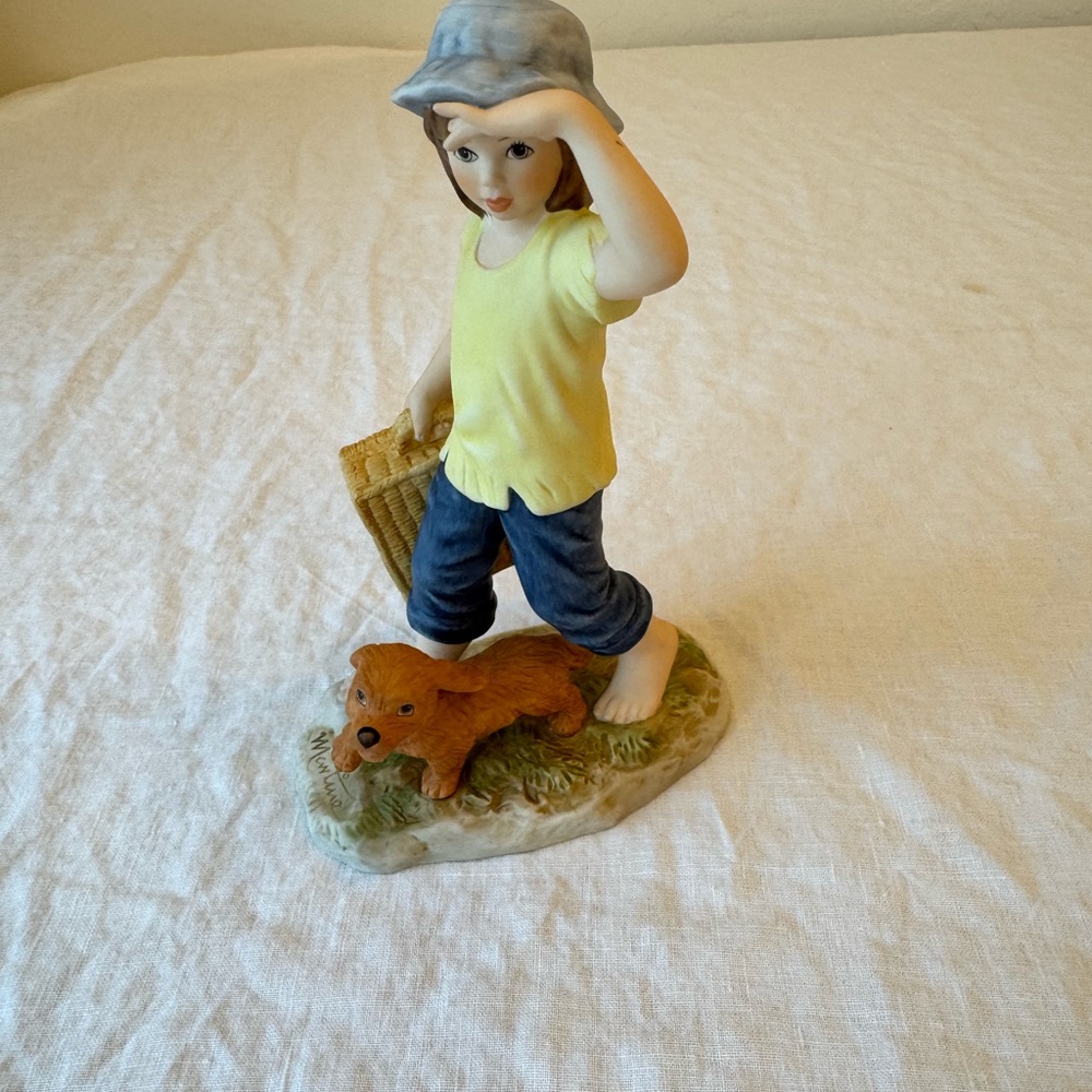 Goebel Figurine with Blue and Yellow Accents